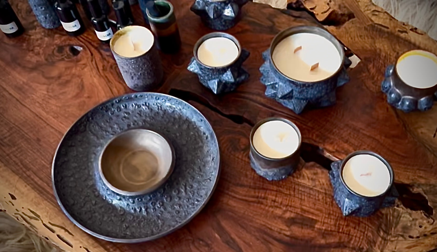 Black and bronze textured home fragrance candles