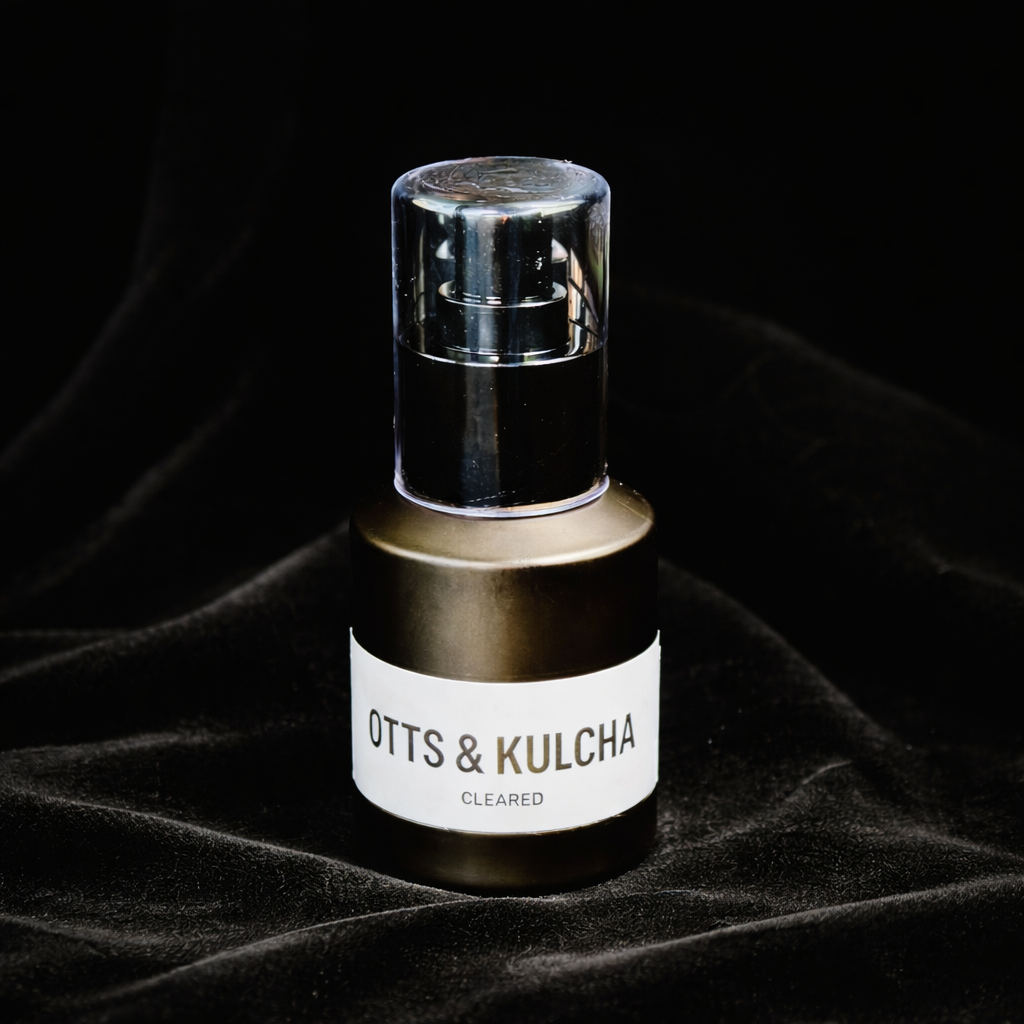 Presence Cleared Body Oil black bottle Otts & Kulcha label