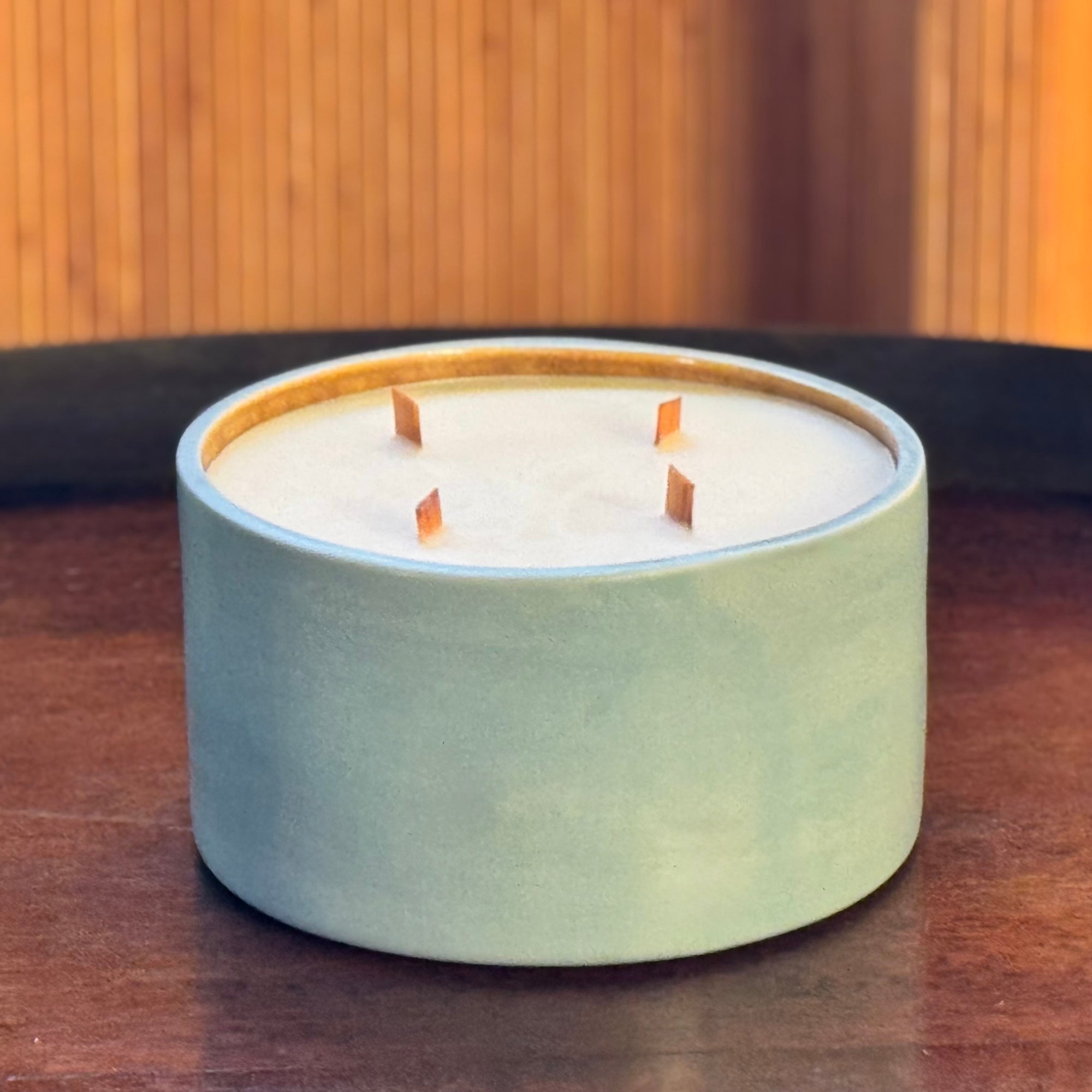 pale blue candle with 4 wicks