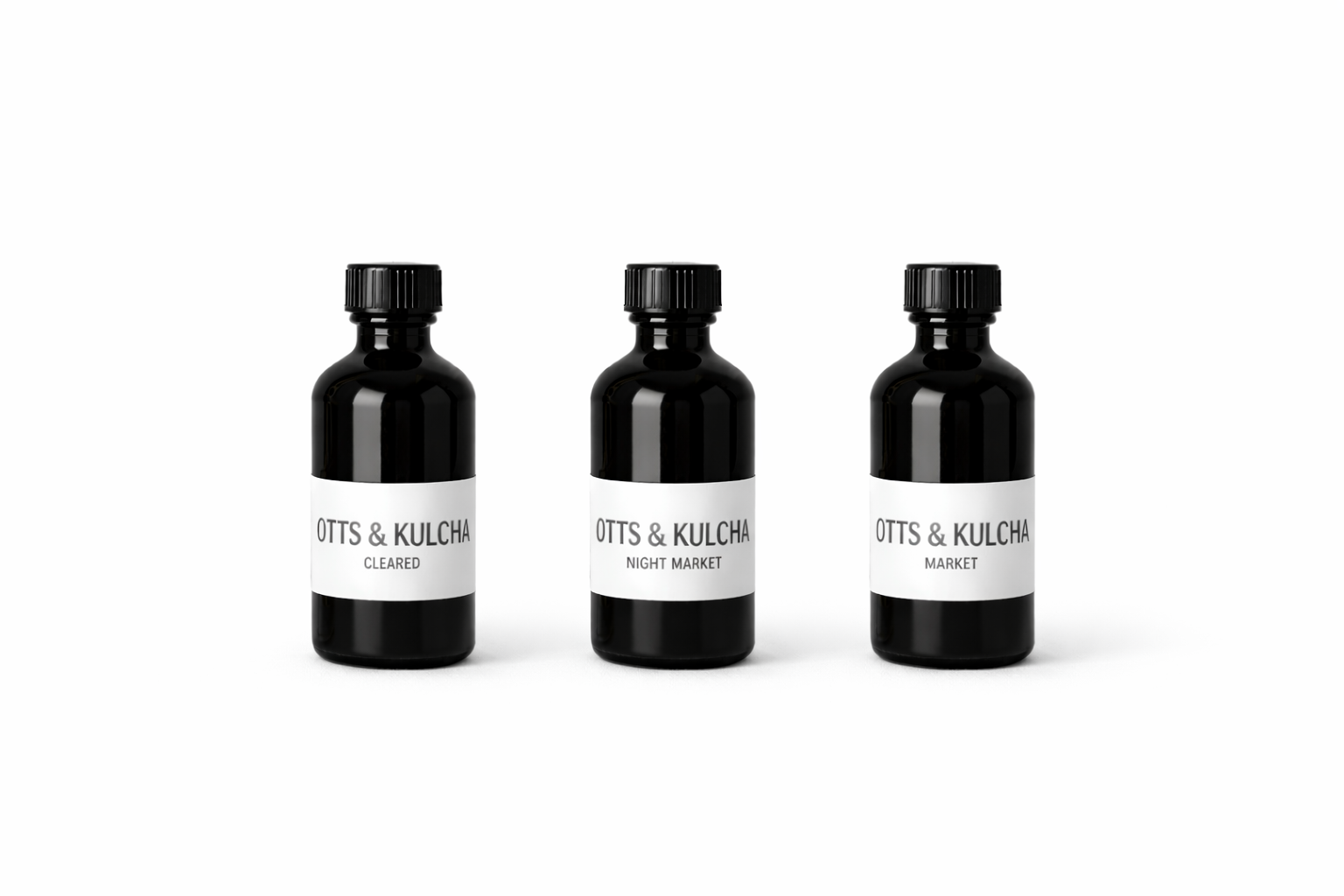 3 Black apothecary bottle labeled market Cleared Night Market