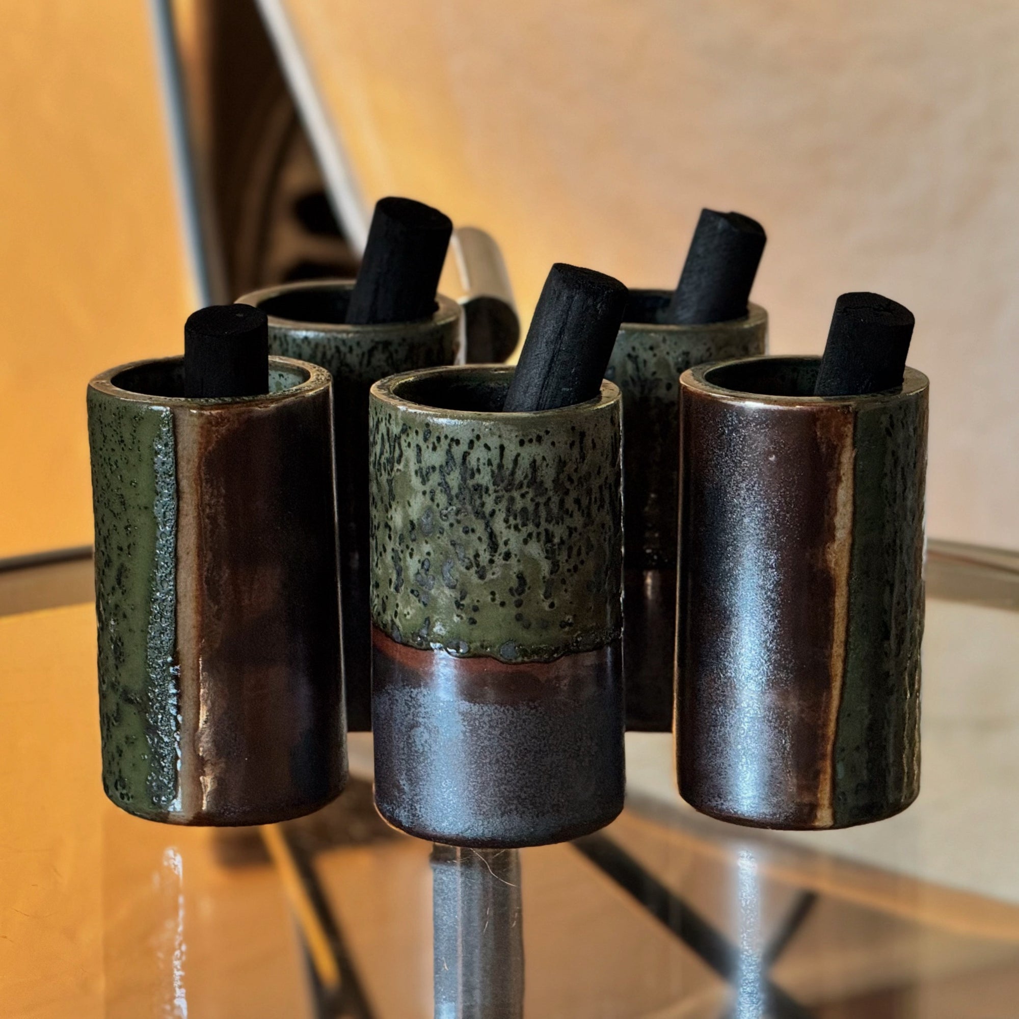 Handmade ceramic diffuser vessel with charcoal wand — available in Basalt, Space Oddity, Grigio Celeste, Virunga, and Pelagic patinas by Otts & Kulcha